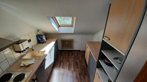 an overhead view of a kitchen with a skylight at Wienhagenblick Ferienwohnung in Kierspe