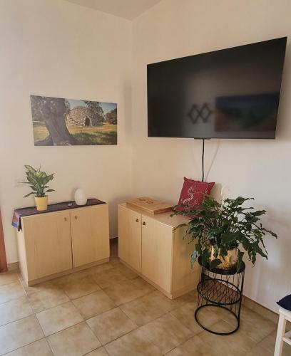 TV a/nebo společenská místnost v ubytování Le Conche - Roca Vecchia