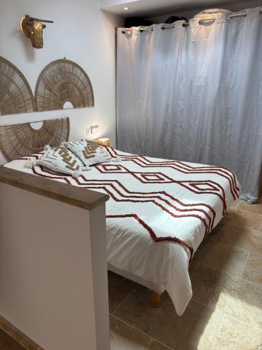 Katil atau katil-katil dalam bilik di Apartment indépendant