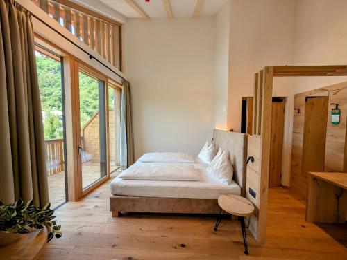 Postel nebo postele na pokoji v ubytování Hotel Schmuckhof