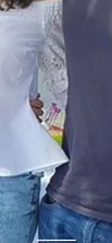 a person is holding a piece of paper at Kalma Lux - Sant Efisio Lofts in Cagliari