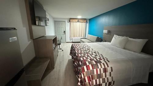 Ένα ή περισσότερα κρεβάτια σε δωμάτιο στο Camden Country Inn