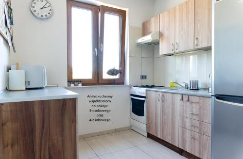 Η κουζίνα ή μικρή κουζίνα στο Wolna Koja Apartament Studio Pokój