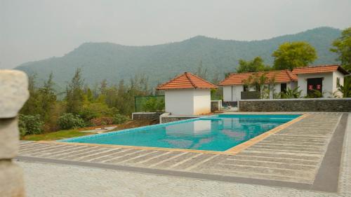 Bazén v ubytování AARA Jungle Resort nebo v jeho okolí