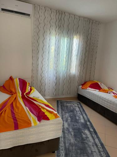 Cama o camas de una habitación en Apartmani Arieta