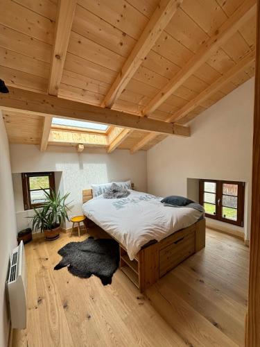 Postel nebo postele na pokoji v ubytování Tiny House - chez l'oncle