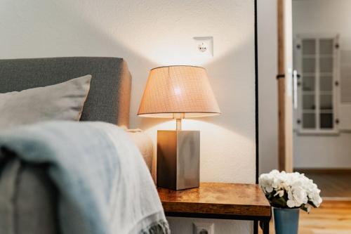 Ένα ή περισσότερα κρεβάτια σε δωμάτιο στο SEENZeit Apartments
