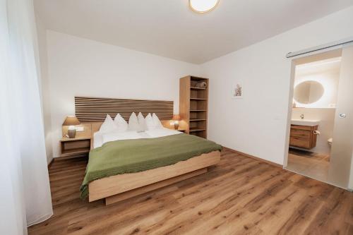 Ένα ή περισσότερα κρεβάτια σε δωμάτιο στο SEENZeit Apartments