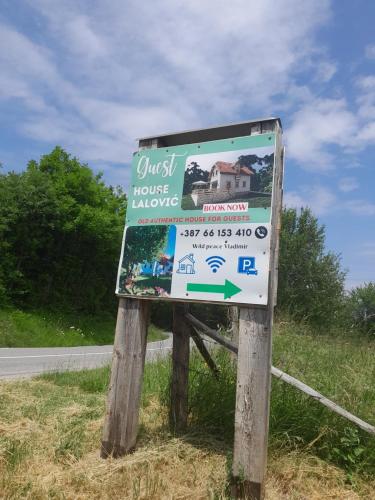 a sign on the side of a road at Wild peace Vladimir in Foča