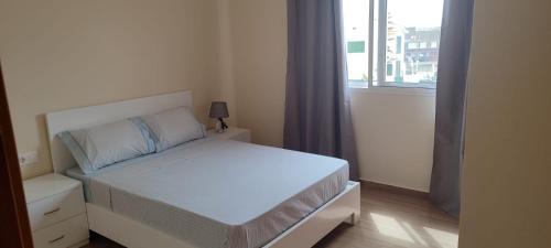 Postel nebo postele na pokoji v ubytování Sams House