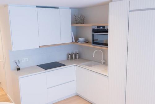 Una cocina o zona de cocina en Studio Nacre Knokke
