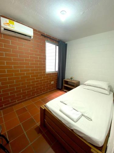 Katil atau katil-katil dalam bilik di Apartasol San Jeronimo
