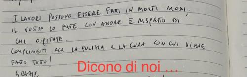 a sheet of paper with handwriting on it at Agatea B&B in Montesarchio