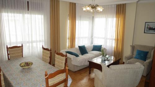 Postel nebo postele na pokoji v ubytování Apartamento Ría de Pontevedra
