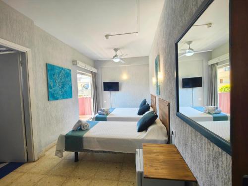 Кровать или кровати в номере Hotel Don Cándido