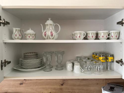 Принадлежности для чая и кофе в Appartement centre-ville rez-de-chaussée