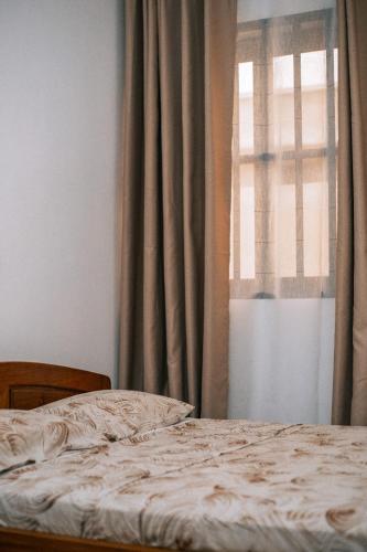 Una cama o camas en una habitación de Nofe fafa