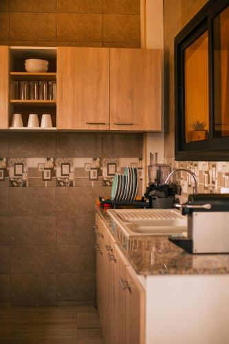 Una cocina o cocineta en Nofe fafa