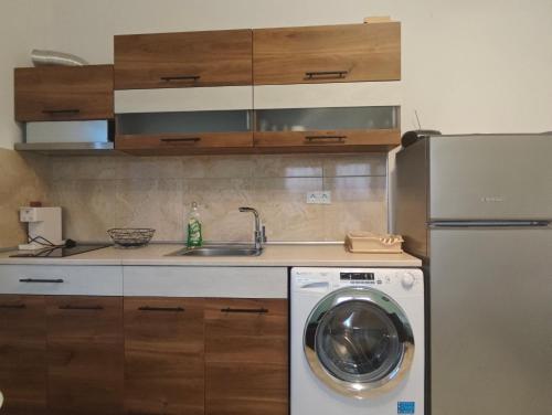 Kuchyň nebo kuchyňský kout v ubytování Aggeliki apartment