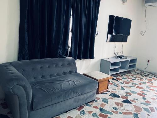 TV a/nebo společenská místnost v ubytování Uno One Airport Inn