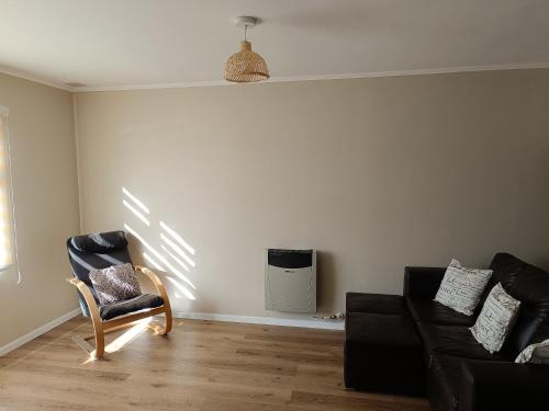 Χώρος καθιστικού στο Casa Residencial Puerto Varas