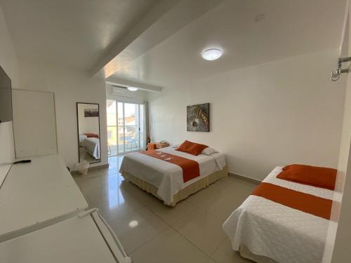 Ένα ή περισσότερα κρεβάτια σε δωμάτιο στο Hotel Santa Fe