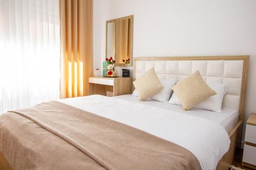 Ένα ή περισσότερα κρεβάτια σε δωμάτιο στο Apartment Numa - Ulcinj