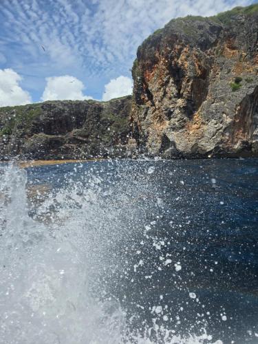 a view of the water from the back of a boat at Dreamvilles Ecovillage Las Galeras in Las Galeras