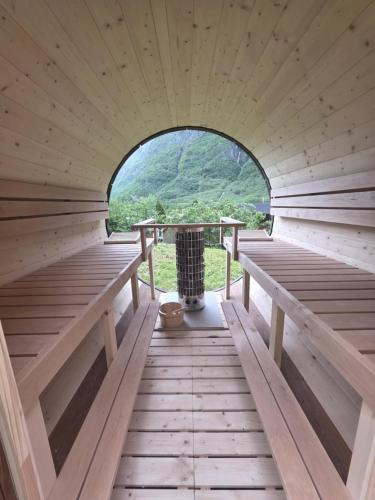 a inside of a sauna with a round window at Gudvangen Camping in Gudvangen