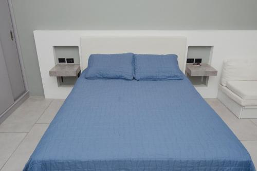 Кровать или кровати в номере Apartamento Santa Rita #6 cerca de restaurantes