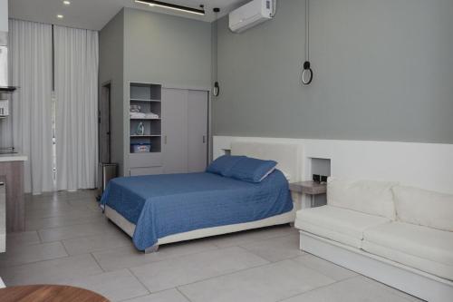 Кровать или кровати в номере Apartamento Santa Rita #6 cerca de restaurantes