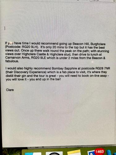a page of a document on a computer screen at Luxurious Country Barn in Baughurst