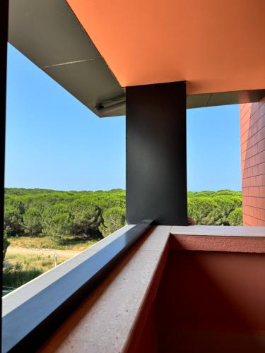 a view from the balcony of a building with an orange roof at FishLand Seaside Apartments in Durrës
