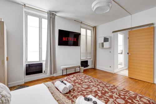 Photo de la galerie de l'établissement Charmant studio au calme a proximite de So Ouest, à Levallois-Perret