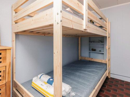 Ένα ή περισσότερα κρεβάτια σε δωμάτιο στο 6 person holiday home in Læsø