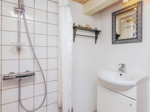 a bathroom with a shower and a sink at 4 person holiday home in Læsø-By Traum in Læsø