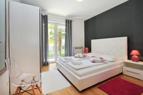 Кровать или кровати в номере Apartments Villa Concept