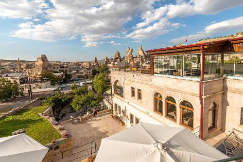 an overhead view of a building with umbrellas at Onur Cave Cappadocia in Goreme