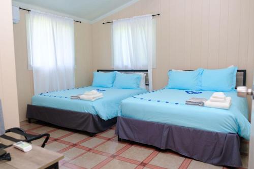 Postel nebo postele na pokoji v ubytování Nestled Vacation Home in St Johns Antigua