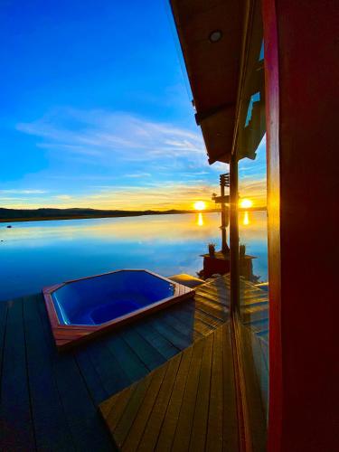 a swimming pool on a deck of a boat at Uros Titicaca Beluxia in Puno