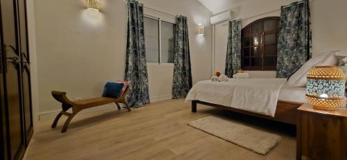 Una cama o camas en una habitación de Domaine Du Paradis