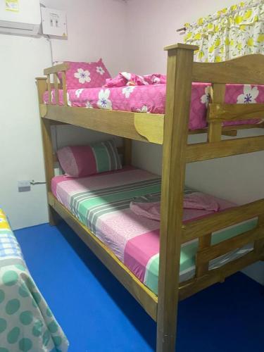 a couple of bunk beds in a room at Los Clemones in Rincón