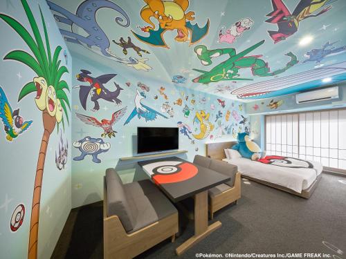 a room with a room with a room with a wall with monsters at MIMARU Tokyo Kinshicho in Tokyo