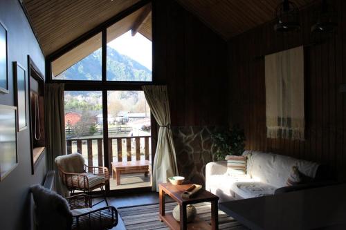 Posezení v ubytování Nevada Malalcahuello