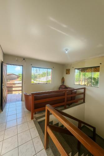 a church with two benches in a room at pousada villa bella mar in Natal