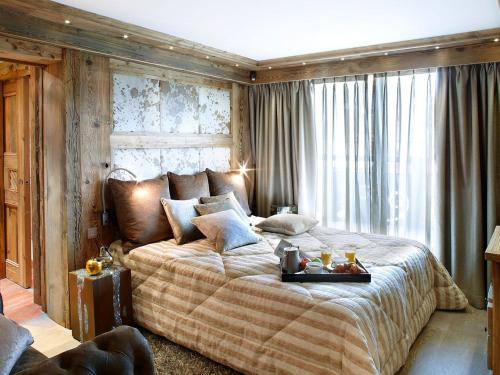 Photo de la galerie de l'établissement Chalet luxueux avec espace détente et spa à Courchevel - FR-1-564-145, à Courchevel