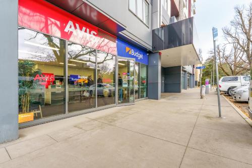 an amazon store on a city street at Convenient City Apartment in the Heart of Braddon - Hosted by Canstay in Braddon