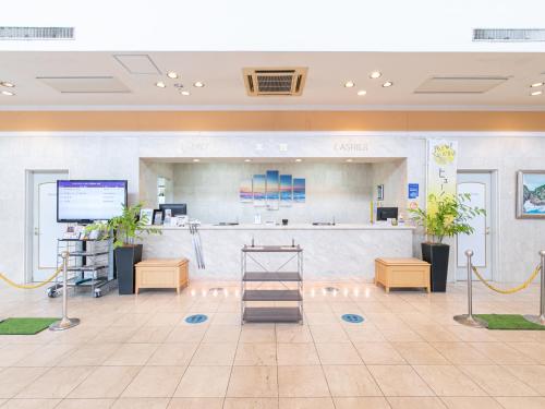 an empty lobby of a hospital with a waiting room at Hotel Verfort Hyuga in Hyuga
