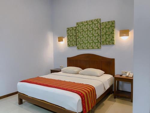 Bukit Daun Hotel & Resortにあるベッド