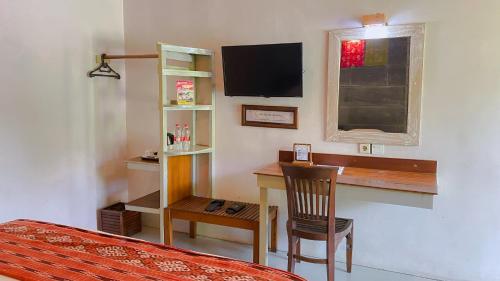 Bukit Daun Hotel & Resortにあるテレビまたはエンターテインメントセンター